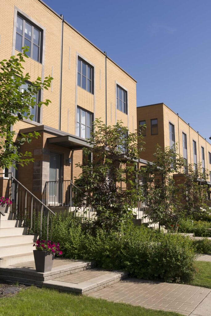 Contemporary townhouses in an urban neighborhood, illustrating missing middle housing options.