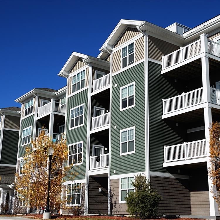 Modern multi-unit multiplex designed for walkable neighborhoods, illustrating missing middle housing.